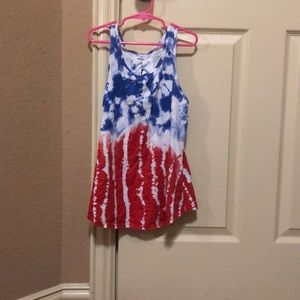 A white blue and red tank top